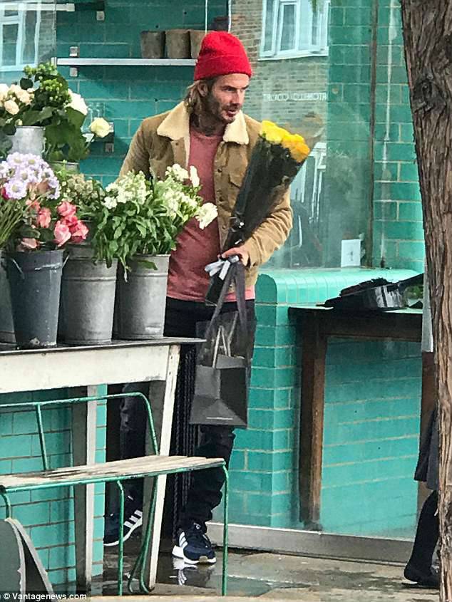 DAVID Beckham Buys harper flowers sept 17 2017