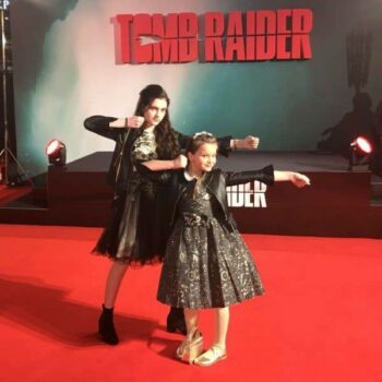 EMILY CAREY & MAISY DE FREITAS The Tomb Raider Movie Red Carpet Premiere
